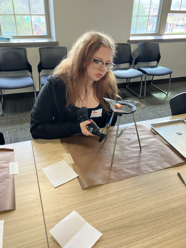 Student working on art/jewelry project
