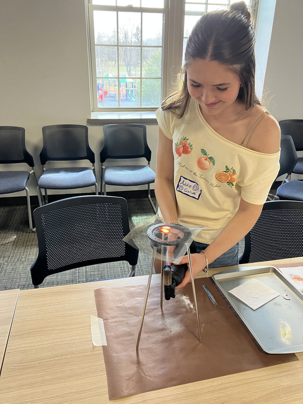 Student working on art/jewelry project