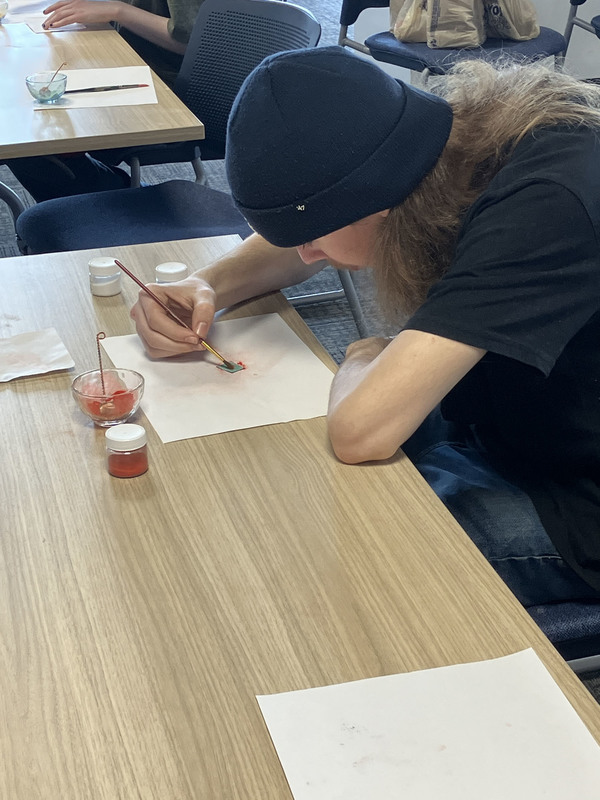 Student working on art/jewelry project
