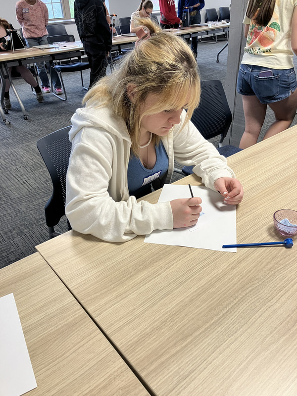Student working on art/jewelry project