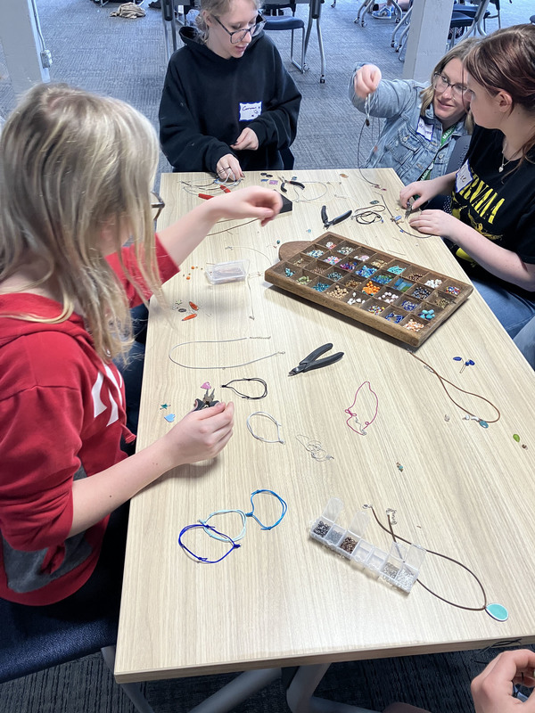 Students working on art/jewelry project