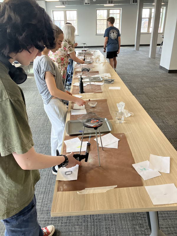 Students working on art/jewelry project