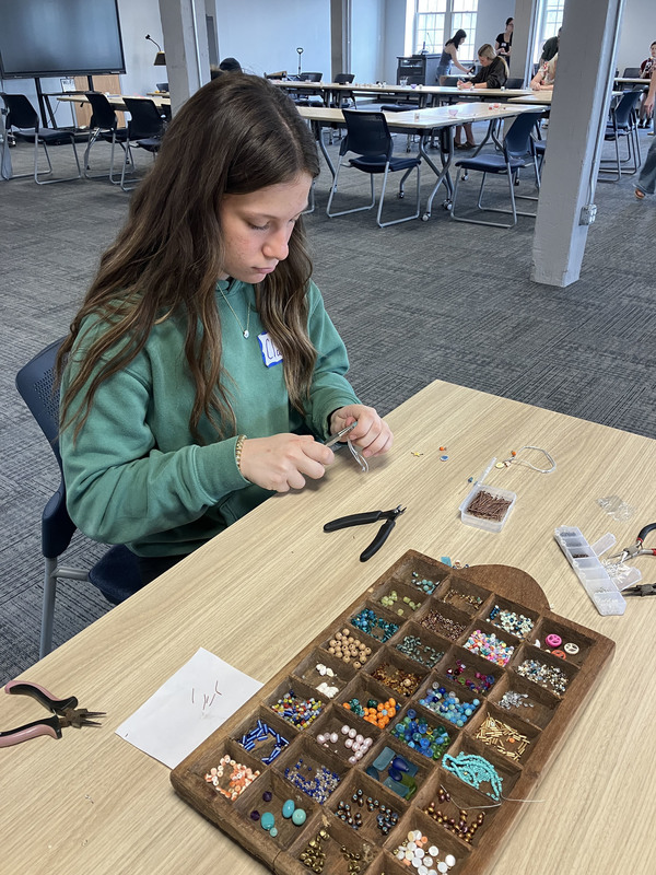 Student working on art/jewelry project