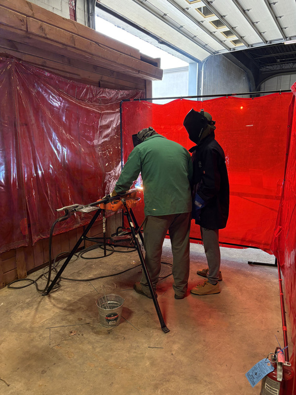 Students trying out hands-on work