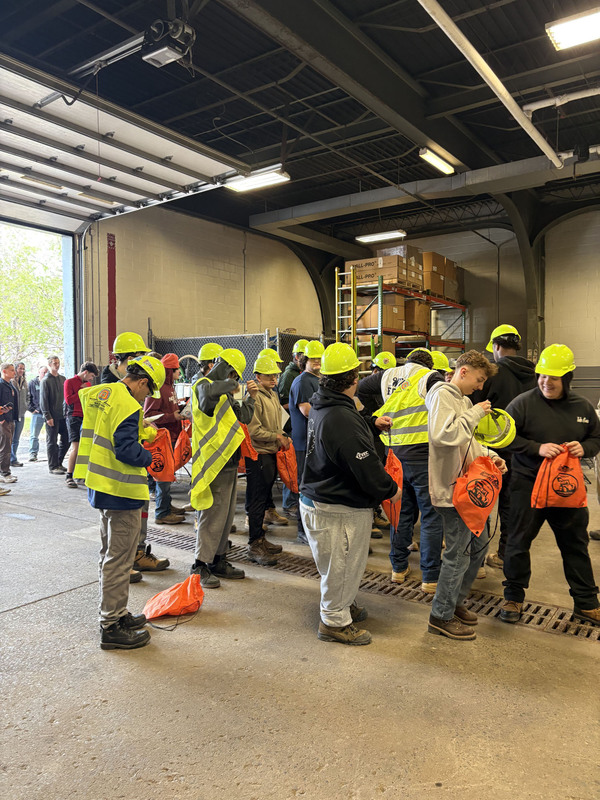 Many students in hard hats in Oneida County DPW