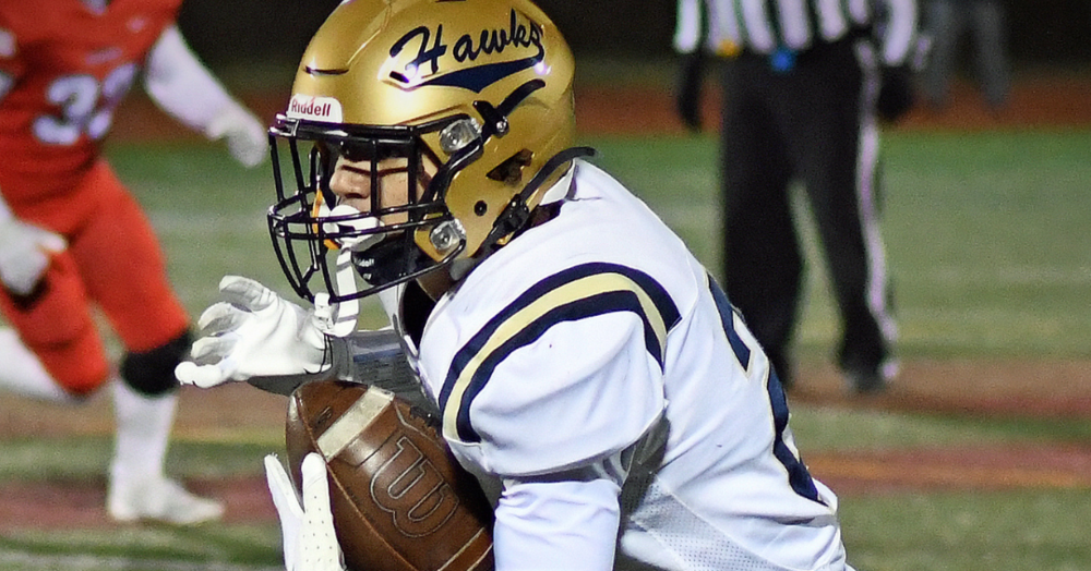 Martin Sleen carries the football