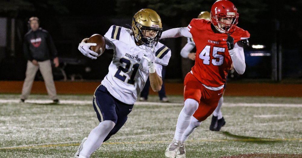 Martin Sleen carries the football