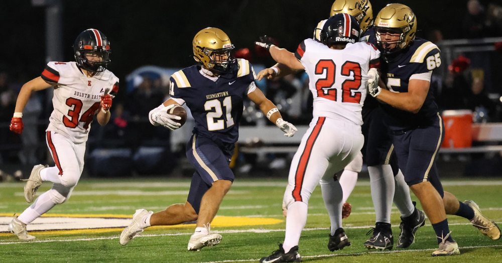 Hermantown's Sleen runs against Duluth East