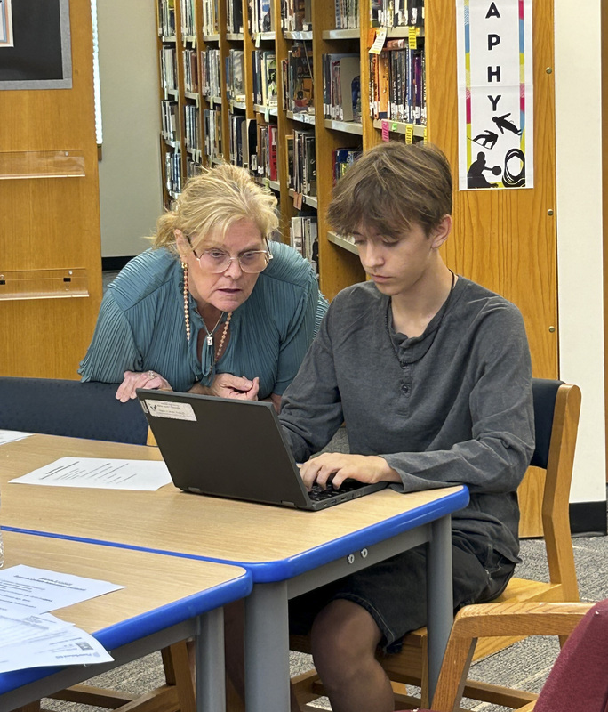 Leslie Smith with student Jacob Morrisette