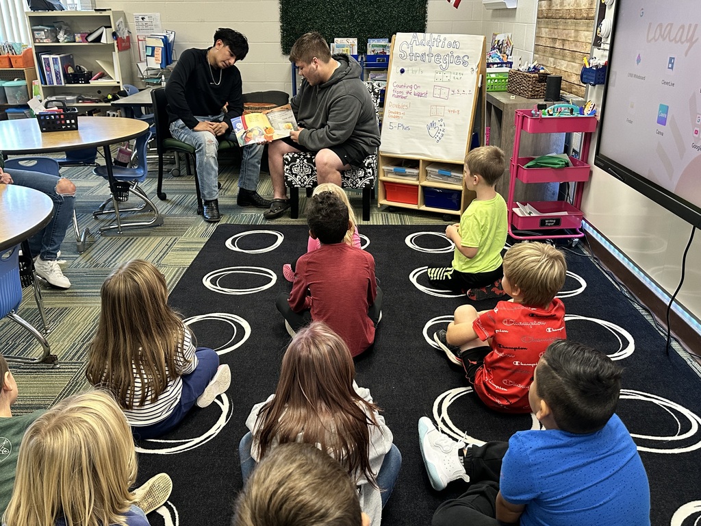 Football Players Reading
