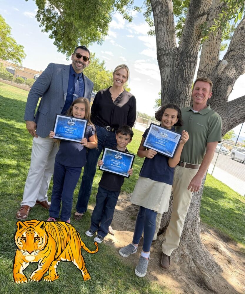 Student Services Coordinator Mr. DeLeon, Topaz Principal Ms. Woods and Topaz Assistant Principal Mr. Lyon recognize three amazing Topaz Tigers as Student Services All-Stars as part of the HUSD Moving the Needle program.