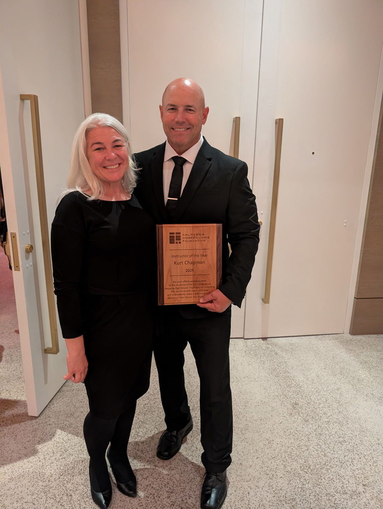 Mr. Chapman with award