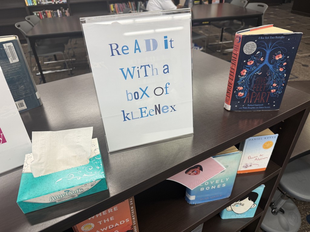 read it with kleenex display
