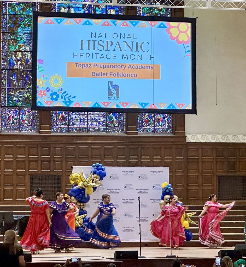 Topaz moms performing cultural dance