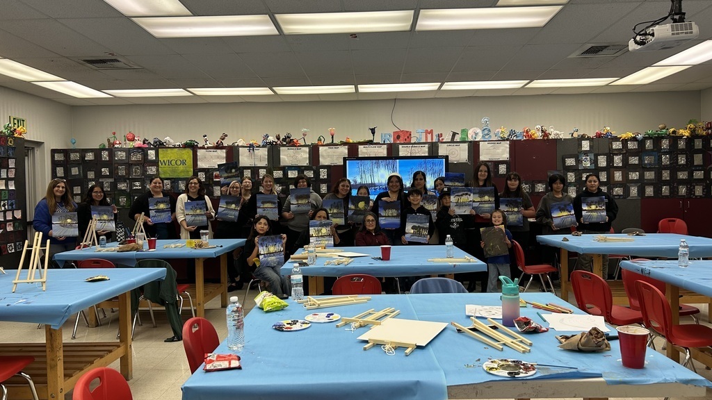 PBIS art event with students, staff, and guardians