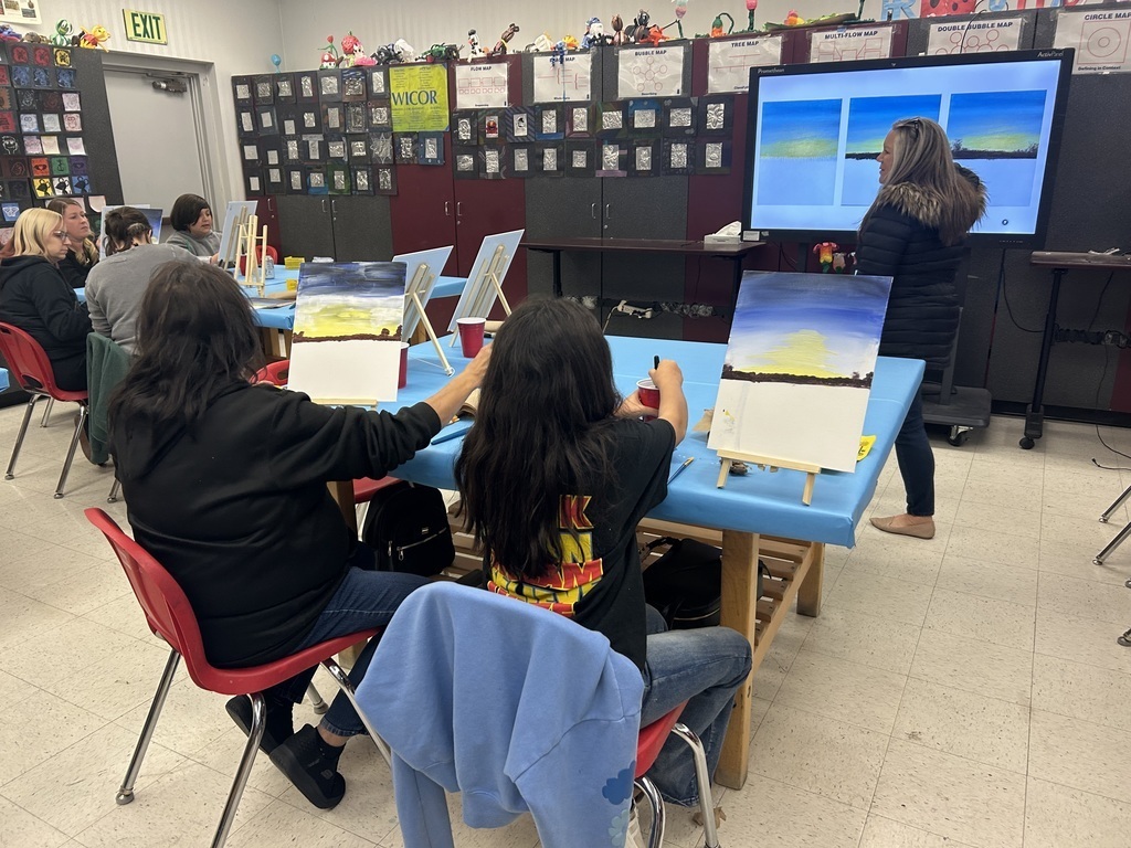 PBIS art event with students, staff, and guardians