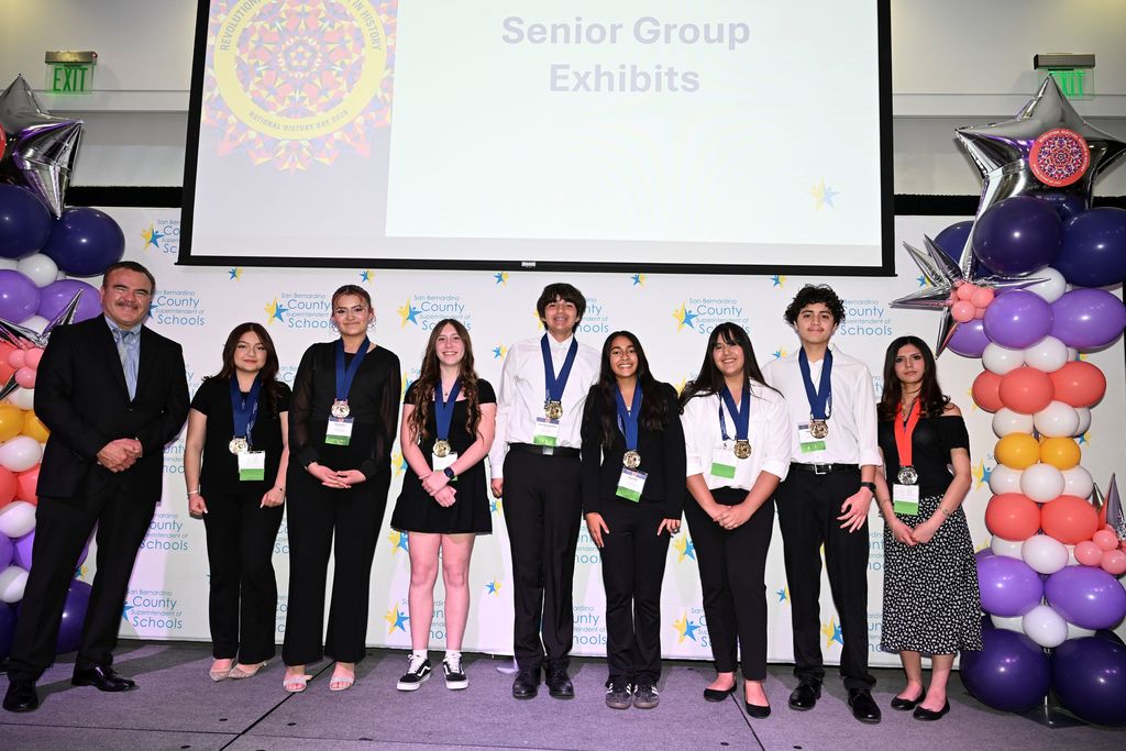 students with Barbie history exhibit