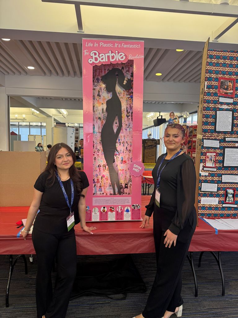 students with Barbie history exhibit