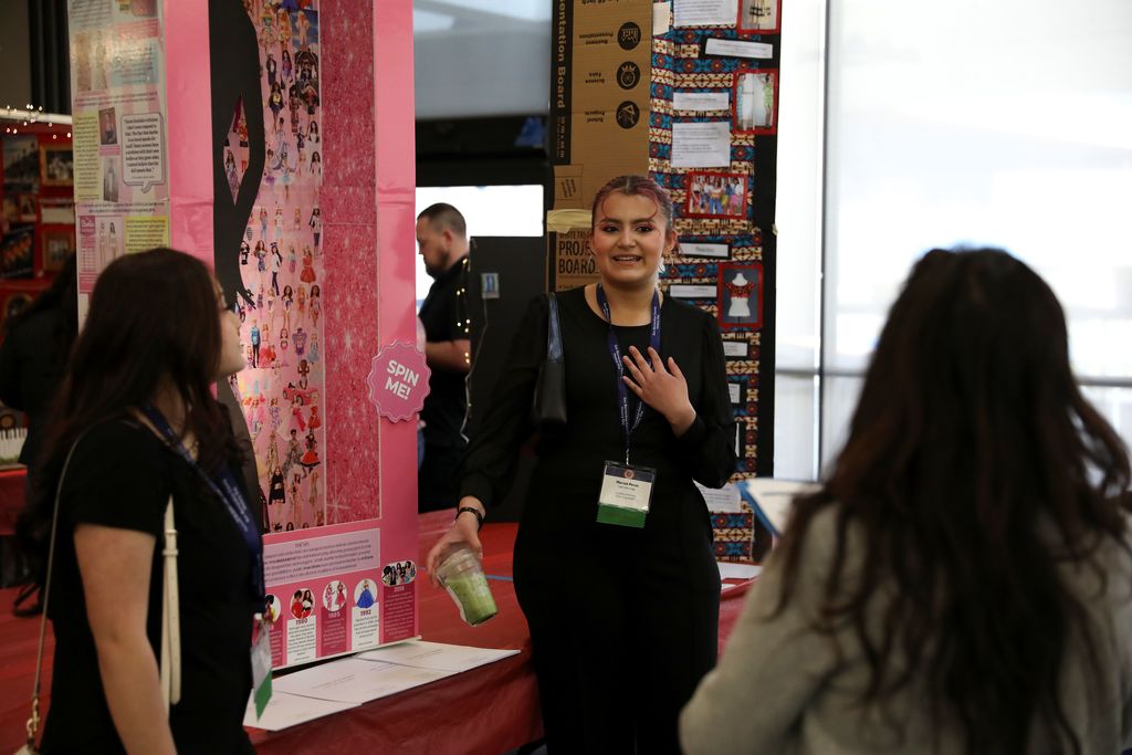 students with Barbie history exhibit