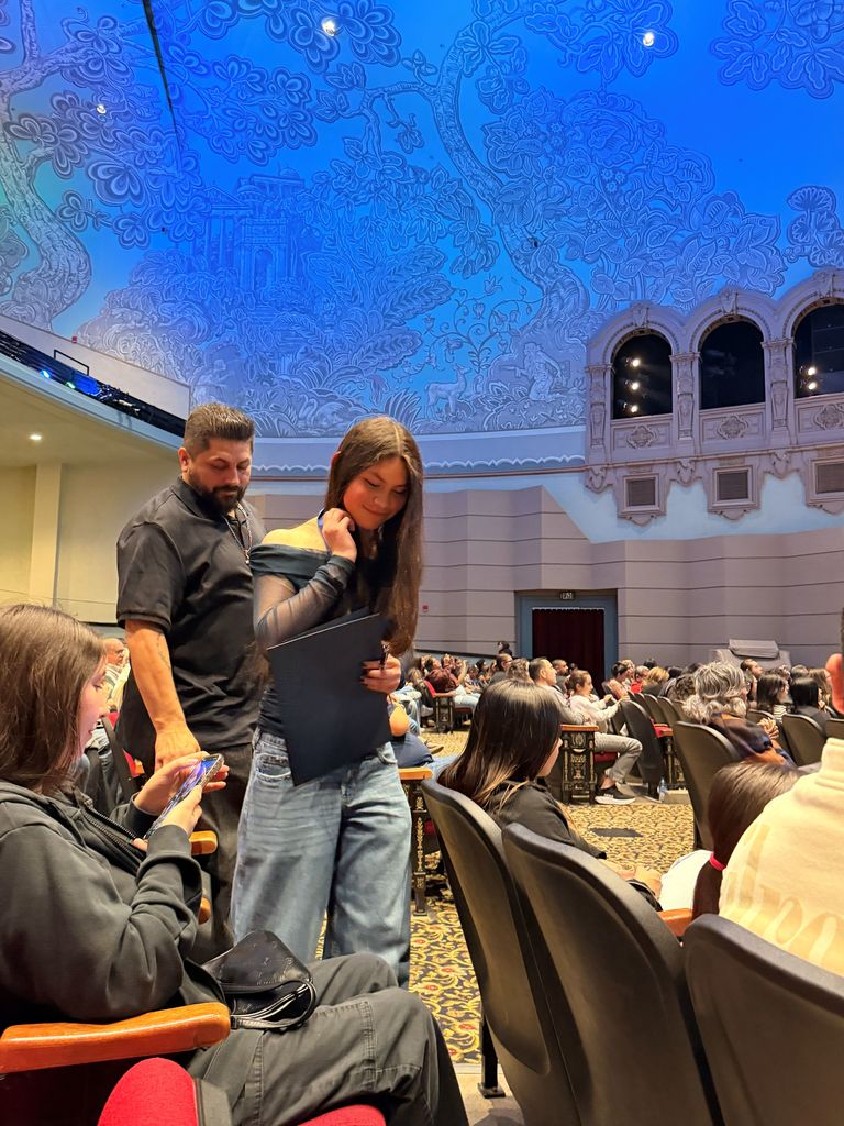 Student receiving an award