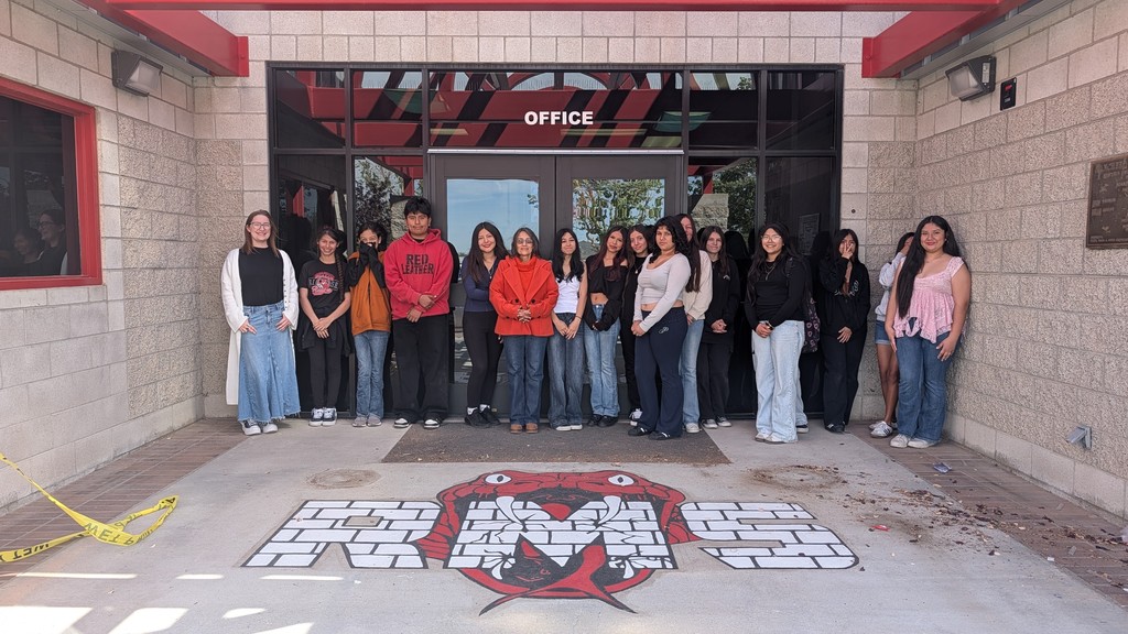 art students painting mural