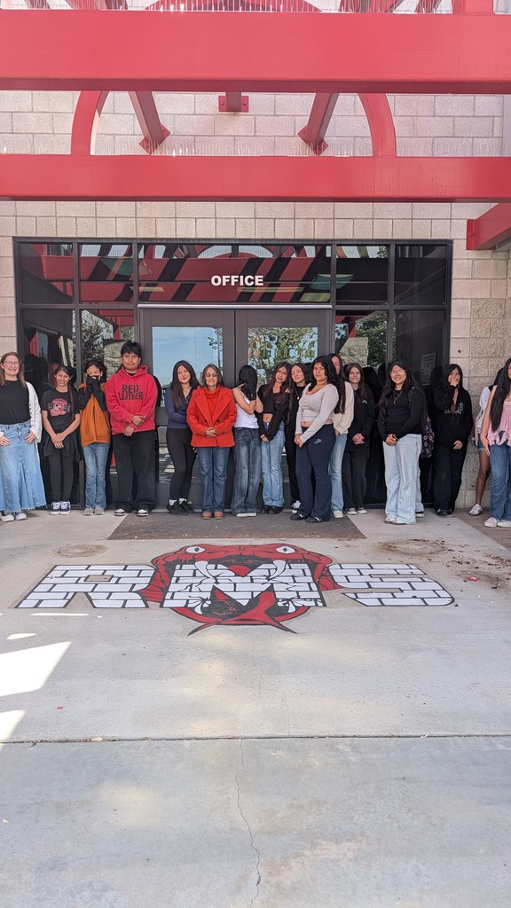 art students painting mural