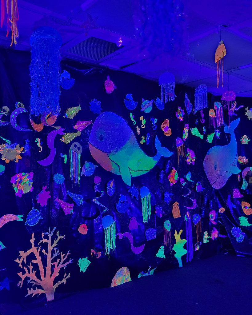 Wall of sea creatures and giant whales