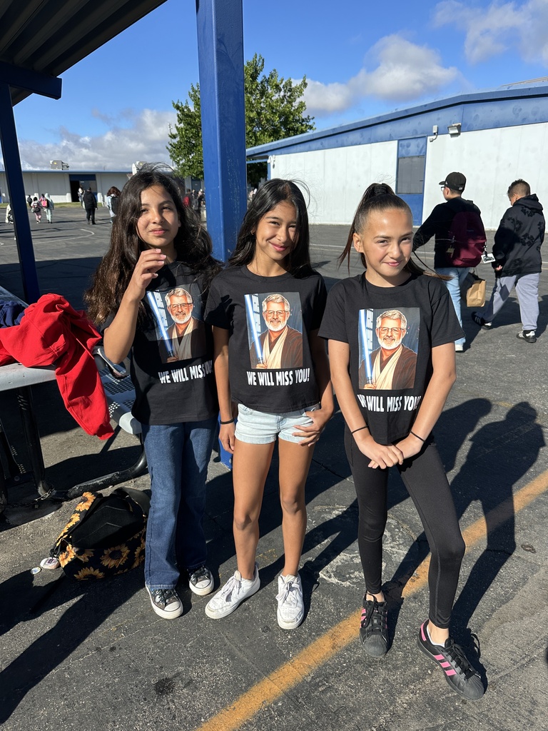 Students  and staff dressed as Mr. Kirk