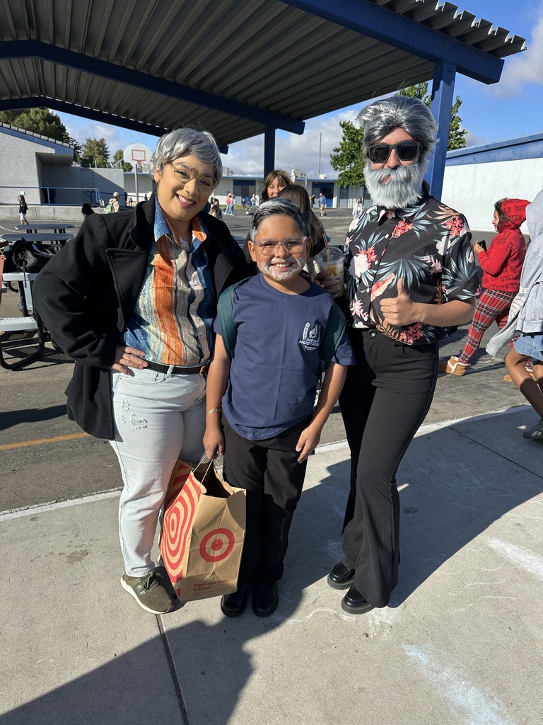 Students  and staff dressed as Mr. Kirk