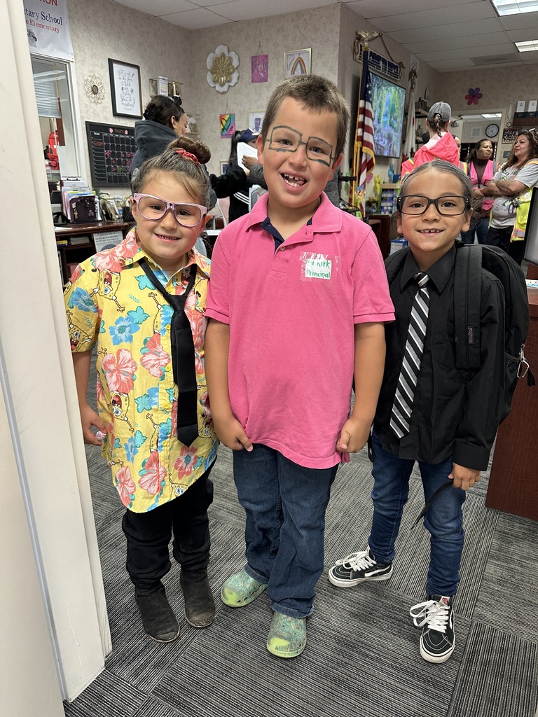 Students  and staff dressed as Mr. Kirk