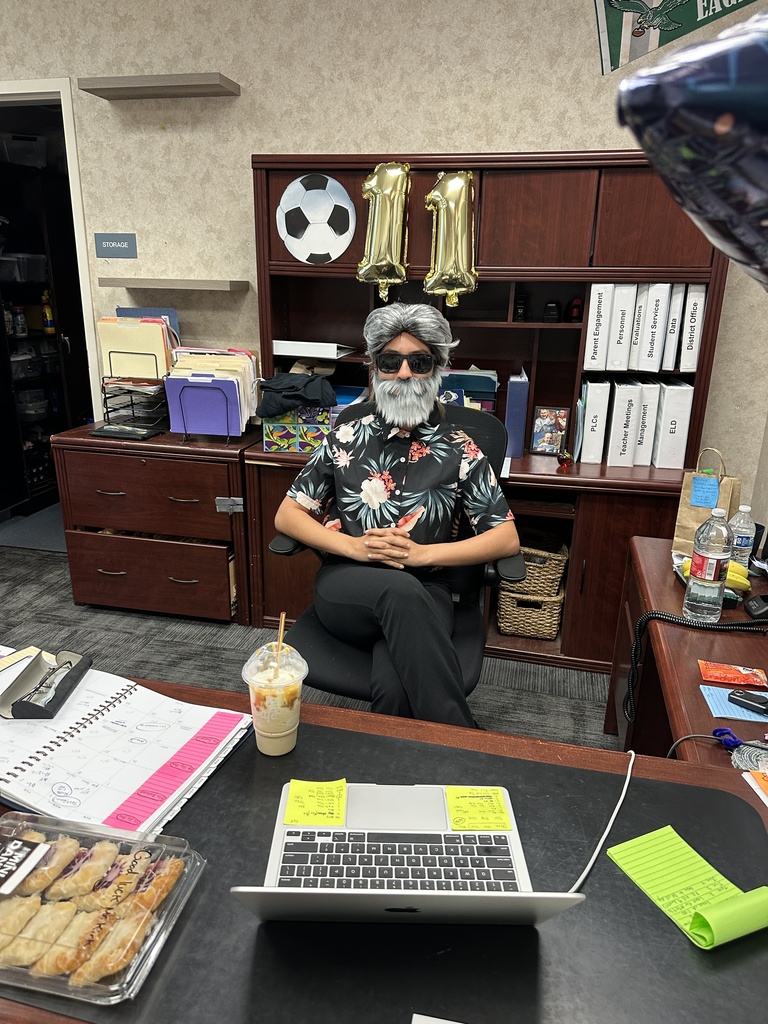 Students  and staff dressed as Mr. Kirk