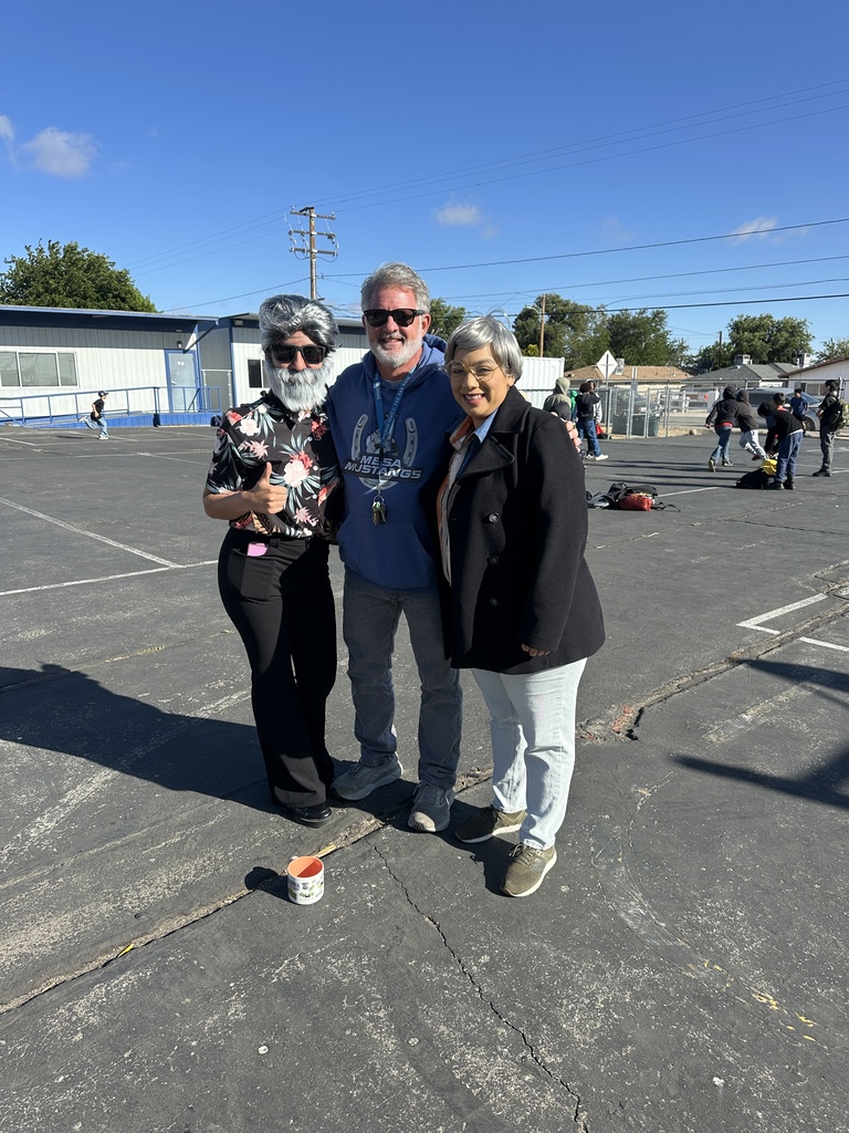 Students  and staff dressed as Mr. Kirk