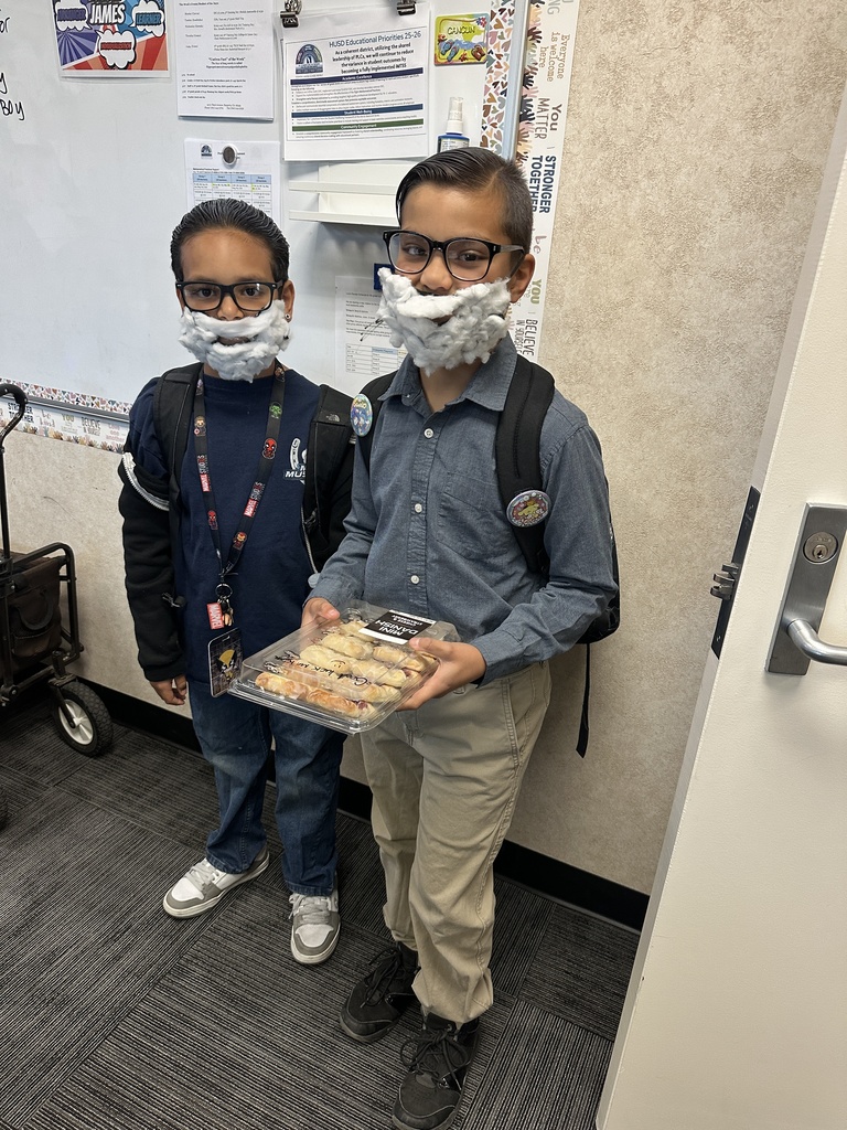 Students  and staff dressed as Mr. Kirk