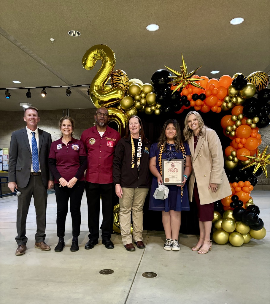 Elk Essay award presentation to student