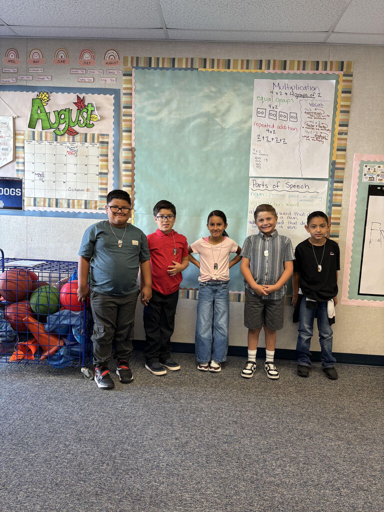 A collection of photos celebrating Joshua Circle Elementary students who earned Perfect Attendance Brag Tags. Students of various grade levels smile and proudly hold or wear their colorful brag tags on necklaces. The photos were taken around campus, including classrooms and outside the school. One large group photo shows several dozen students together, while the other photos feature smaller groups of students displaying their awards.