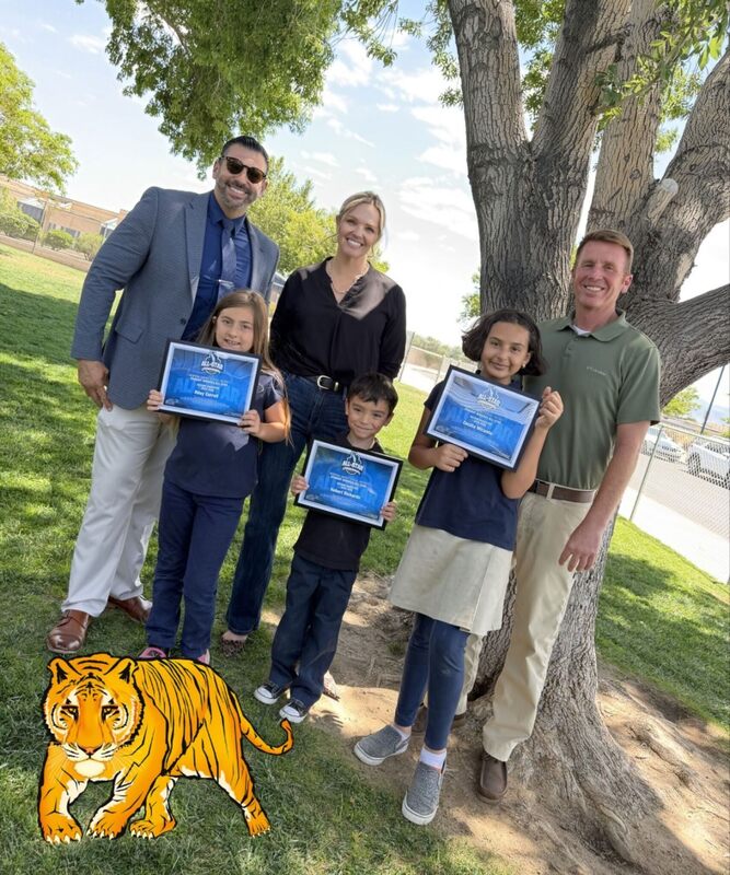 Student Services Coordinator Mr. DeLeon, Topaz Principal Ms. Woods and Topaz Assistant Principal Mr. Lyon recognize three amazing Topaz Tigers as Student Services All-Stars as part of the HUSD Moving the Needle program.