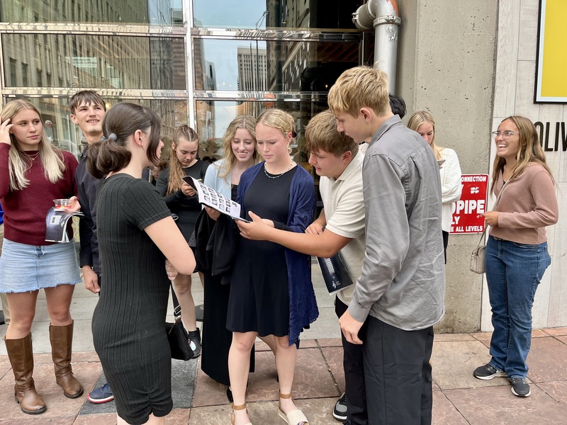 The conversation continues after the curtain closes as students discuss the cast and different elements of the Broadway production.