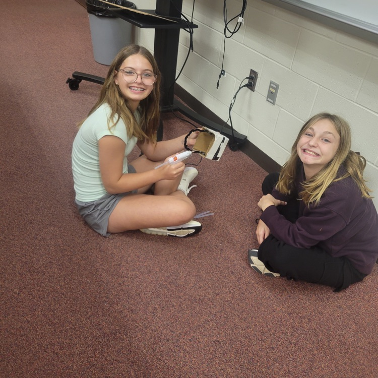6th grade is hard at work completing their first engineering design challenge in STEAM class. They have to design and construct a way for a small action figure to get across a zipline! 