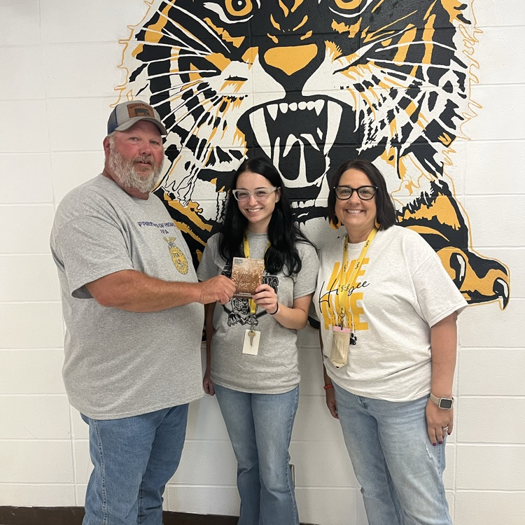 Mike Walters Friends of FFA President, Alexis Couldry FFA Advisor and Mandy Niemeier, Principal
