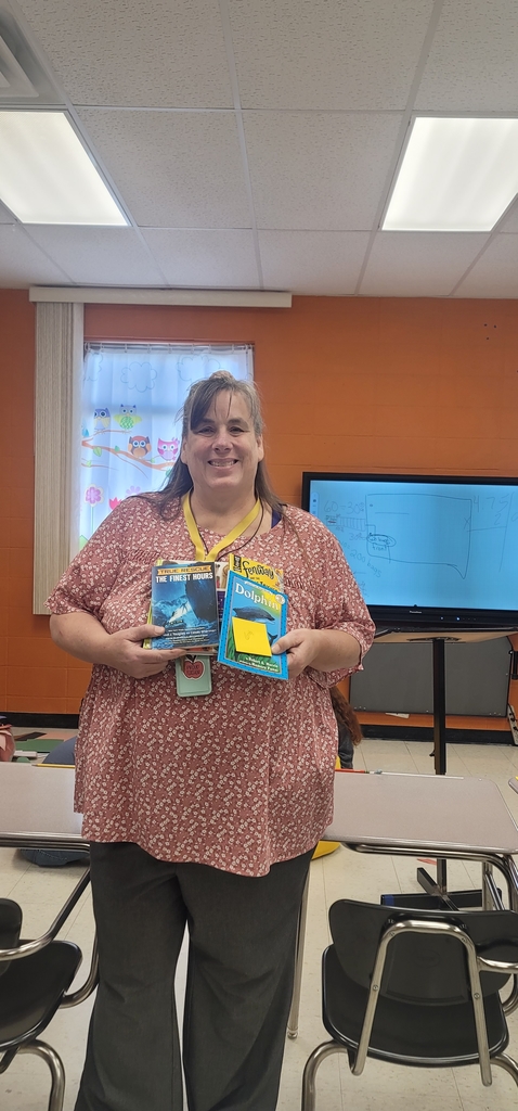 Mrs. Young is over the moon about new books!