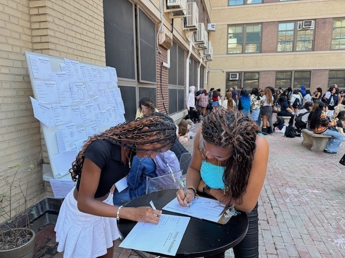 Students fill out profiles for the Library Friendwall on the first day of school!