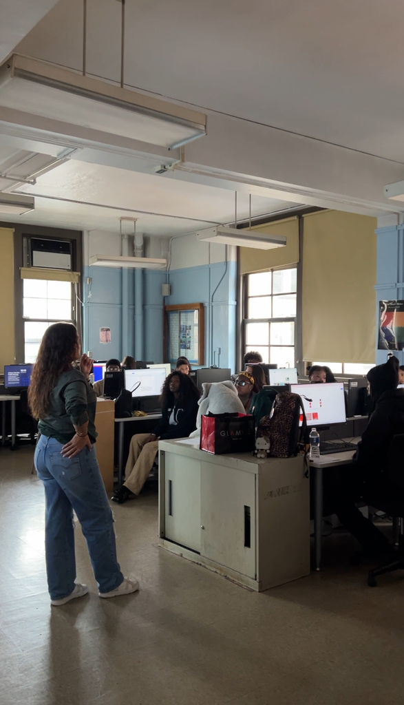 Ms. Vaccaro's senior class during their morning meeting discussing upcoming FLY merchandise