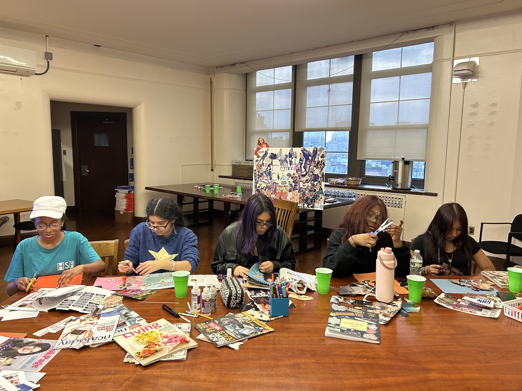 Feminist Club members identifying images for inspiration
