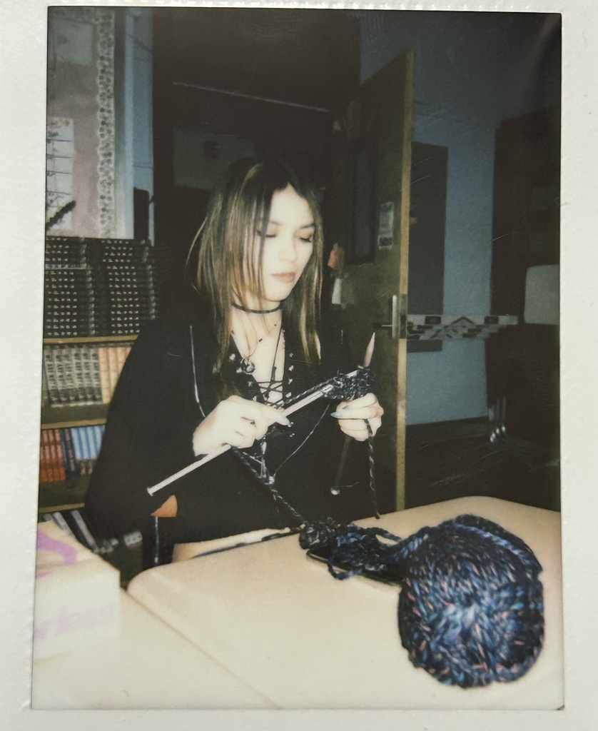 student knitting