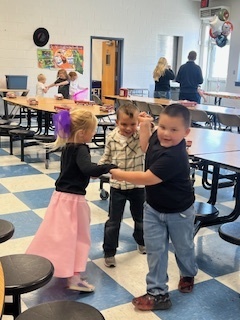 🎉 Kindergarten is 50 Days Smarter! 🎉  Last week, our Kindergarten students celebrated reaching the 50-day milestone with a fun 1950s-themed sock hop! 🧦💃🕺  From dancing to dressing up, it was a wonderful way to mark 50 days of learning, growing, and having fun together! 💛📚