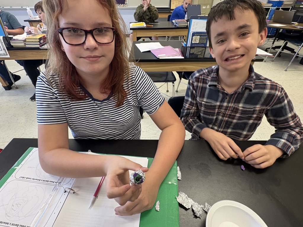 Our 5th grade students are diving into the layers of the Earth! 🌍 To kick off the week after spring break, they created hands-on models using marbles, play-dough, and aluminum foil. The activity was a big hit—students loved getting a close-up look at what’s beneath the Earth’s surface!