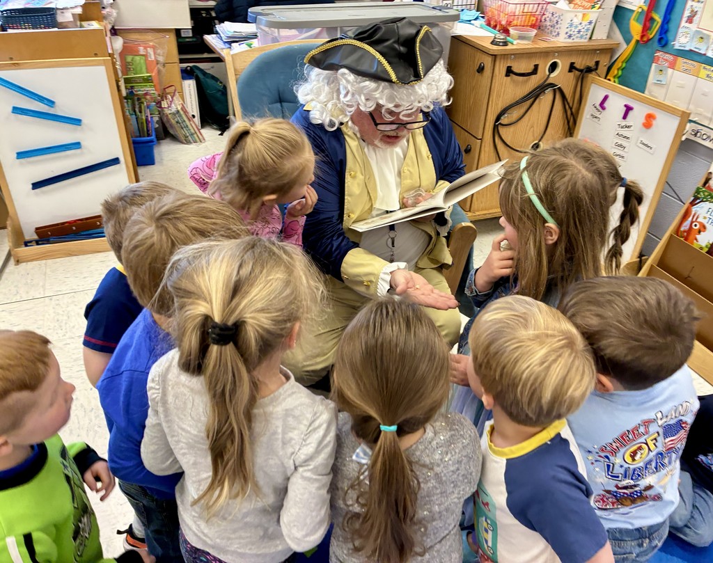 🇺🇸  Our preschoolers had a special visit from none other than George Washington today! He stopped by to read a story… but things got a little interesting when his teeth fell out mid-visit! 😆🦷  The students were full of giggles while learning a little history along the way—definitely a moment they won’t forget! ❤️📚  We love bringing learning to life in fun and memorable ways. Way to go, Rams! 🐏👏
