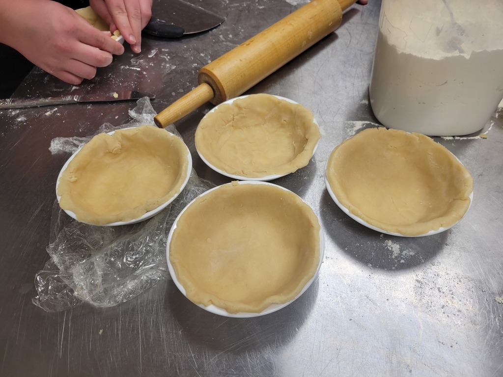 Today Culinary Arts students ended the week on a sweet note.  They made peanut butter and apple pies.  We began with our homemade crust and layered on the goodness from there.  Great job guys!