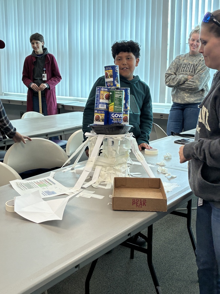 ✨🔭 Our Highland Elementary gifted students recently enjoyed an exciting educational trip to the Green Bank Observatory! Students toured the grounds and discovered a variety of incredible radio telescopes, including the Green Bank Telescope (GBT)—the largest fully steerable radio telescope in the United States! 🤯 It stands over 300 feet tall with an aperture the size of a football field! 🏈📡 Students also explored interactive exhibits and put their engineering skills to the test in a fun challenge—building telescope towers out of paper strong enough to hold canned food! 🛠️📚 To top off a fantastic day of learning, everyone enjoyed a pizza party at the Starlight Café! 🍕🌟 What an amazing hands-on experience exploring science, engineering, and the wonders of space! 🚀💙💛