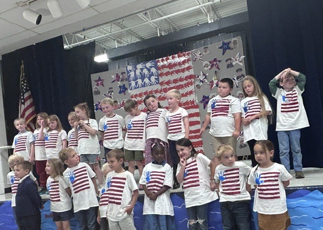 Our kindergarten students truly had a night to shine at HES! Families gathered for a picnic dinner before enjoying a wonderful performance by the children. In celebration of our nation's 250th anniversary, the students proudly recited selections from The Flag We Love by Judi Harris and sang several beloved American songs. The program also featured students portraying historical figures from our SOL studies, bringing history to life for the audience. The evening included a retelling of the classic tale The Three Billy Goats Gruff, followed by a fun and humorous twist with The Three Silly Girls Grubb by John and Ann Hassett. The children did an amazing job showcasing their learning, confidence, and creativity. Thank you to all the families who attended and supported this special event. It was a memorable evening filled with smiles, laughter, and pride in all our young learners! 🌟🇺🇸📚🎶